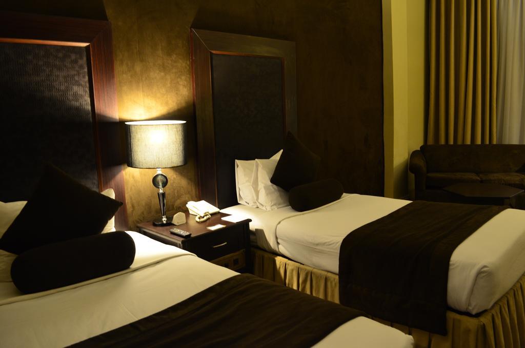 Smart Hotel Лахор Номер фото
